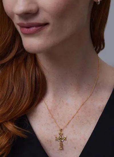 Close up shot of red haired model wearing 14Ct Gold Vermeil Celtic Cross Pendant with White 